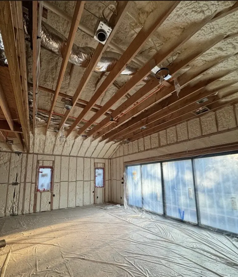 Interior walls and ceiling insulated with spray foam during new construction in Conneaut